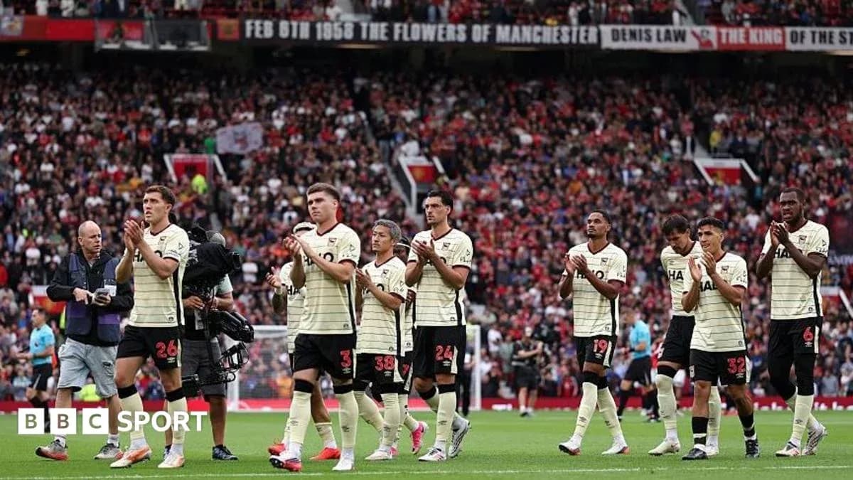 Players applauding fans after the match at stadium Players applauding fans after the match at stadium