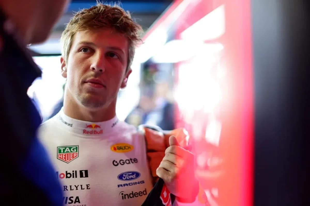Driver preparing in the garage before the race Driver preparing in the garage before the race