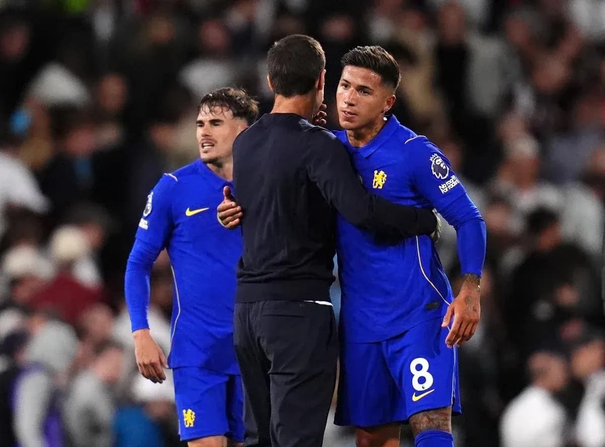 Chelsea players and coach in post-match embrace Chelsea players and coach in post-match embrace
