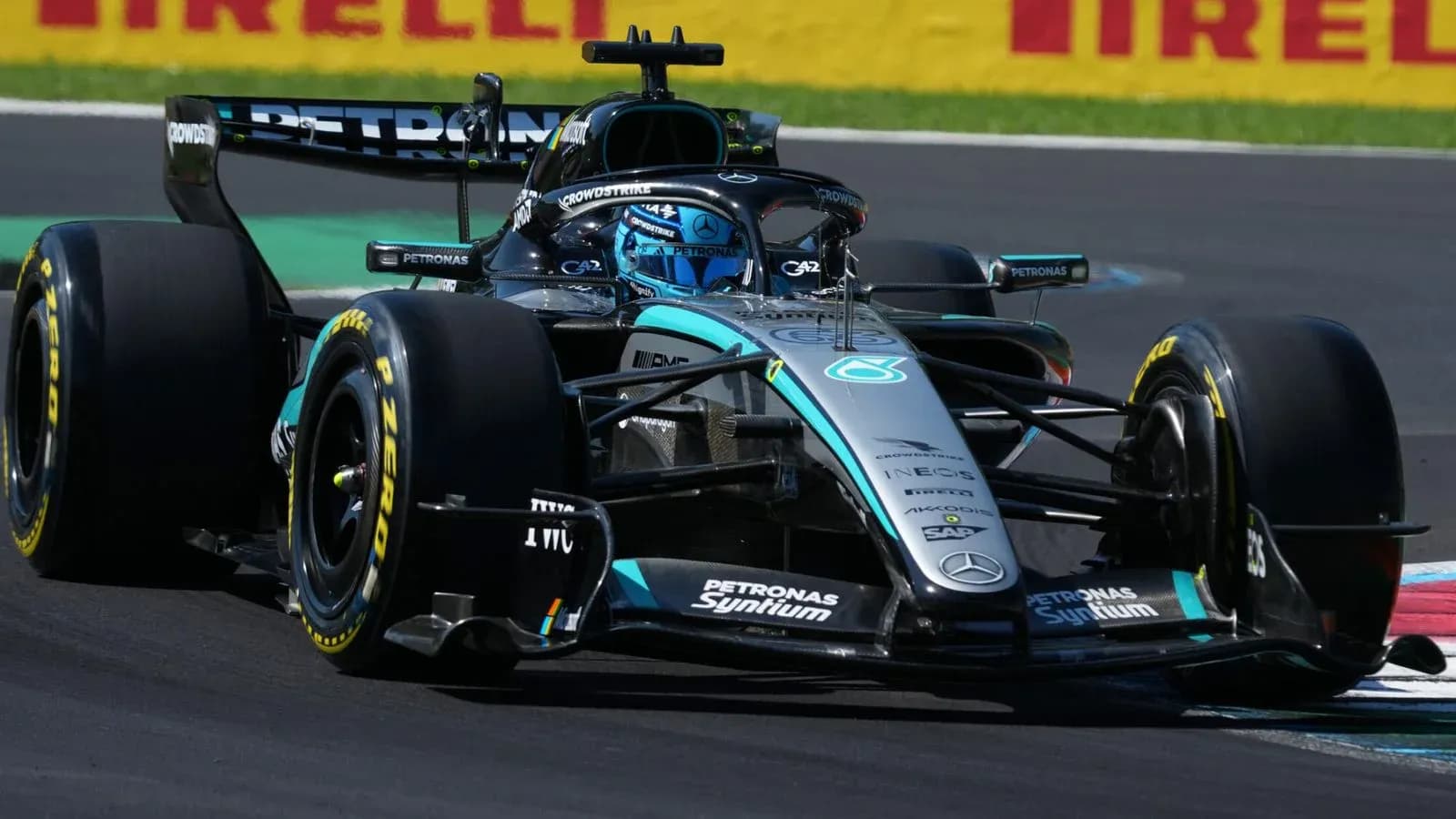 Mercedes Formula 1 car racing on track Mercedes Formula 1 car racing on track
