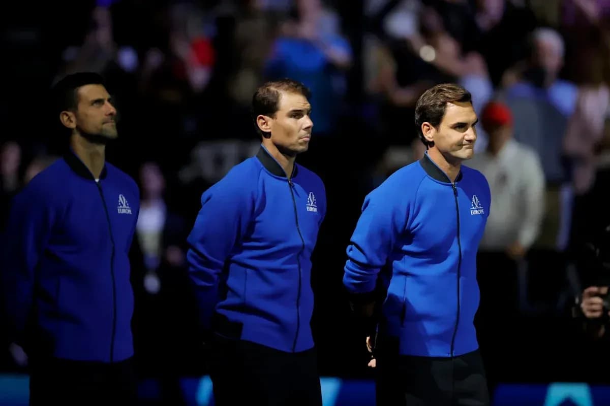 Three tennis players in blue jackets on stage Three tennis players in blue jackets on stage
