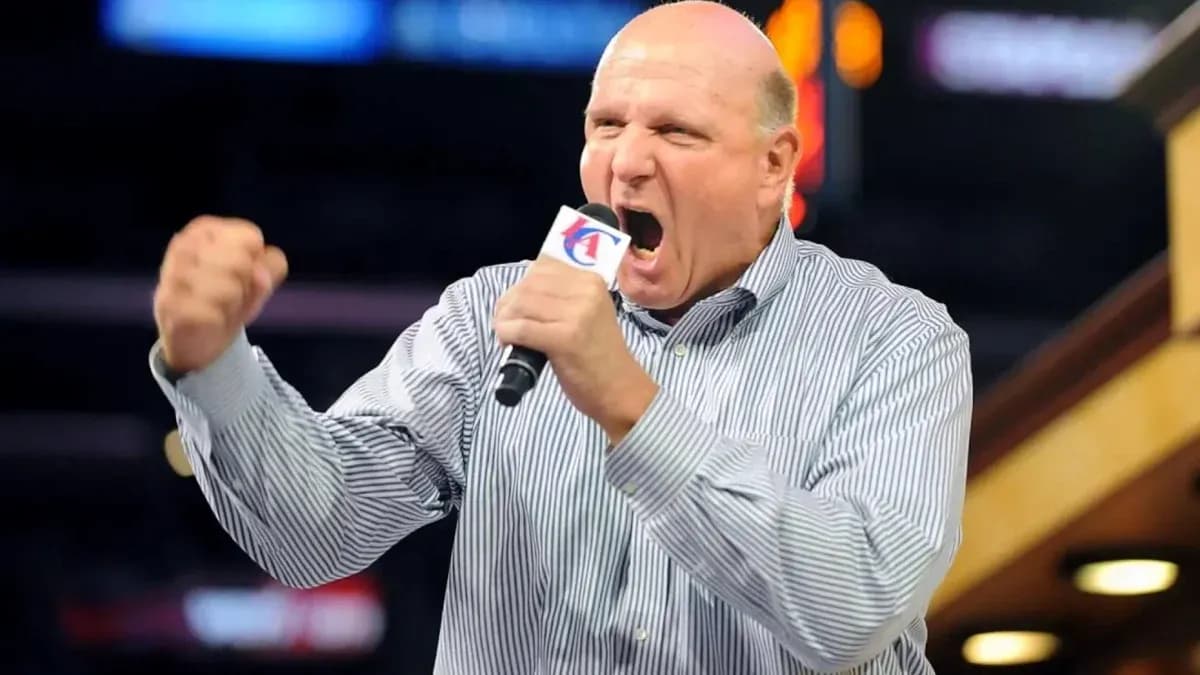 Man passionately speaking into microphone at event Man passionately speaking into microphone at event