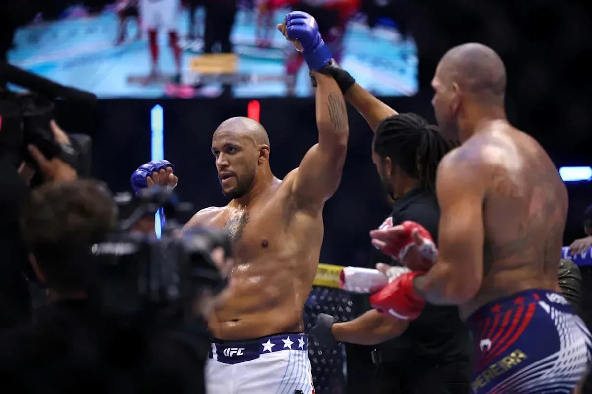 Fighter celebrating victory after MMA match Fighter celebrating victory after MMA match