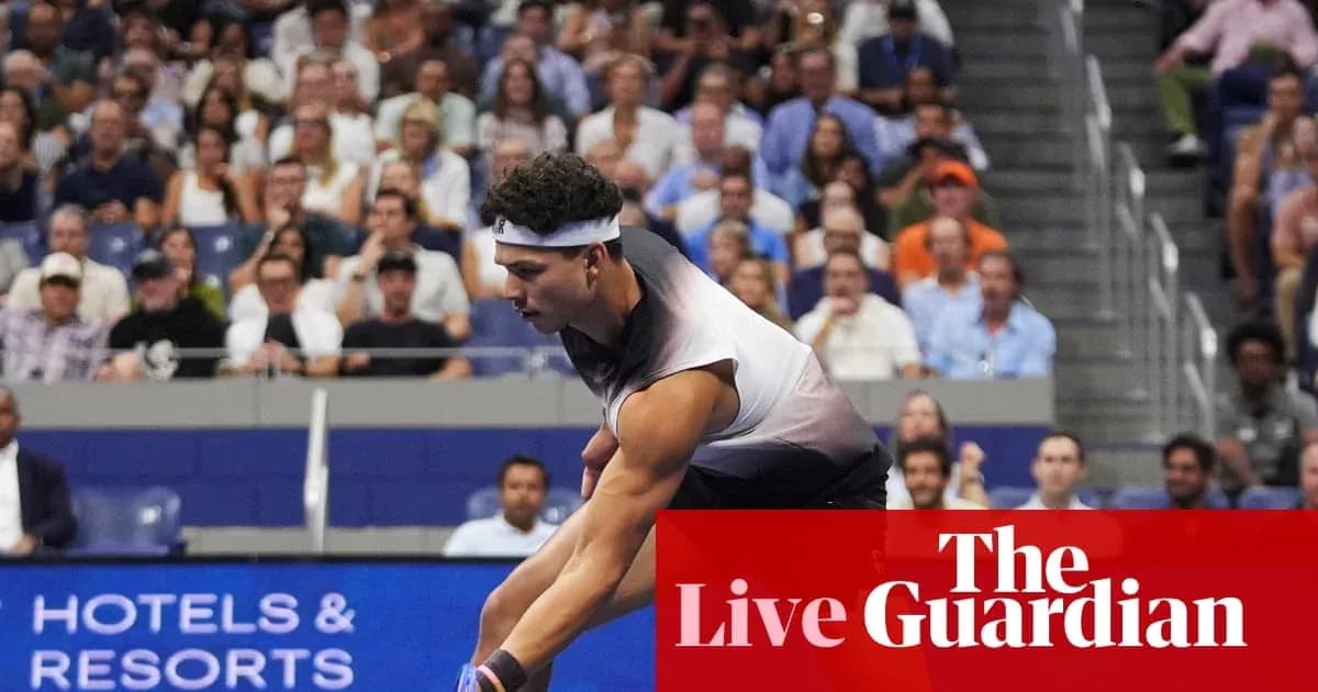 Player serving during a tennis match with spectators Player serving during a tennis match with spectators