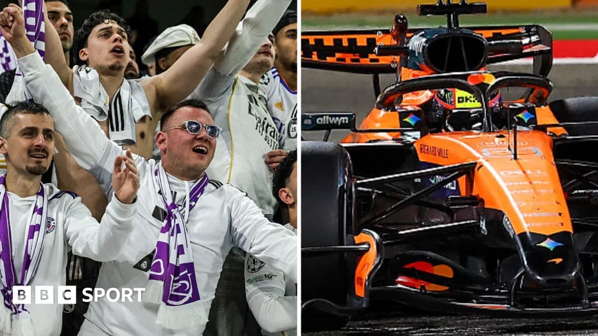 Sports fans celebrating alongside a McLaren Formula 1 car Sports fans celebrating alongside a McLaren Formula 1 car