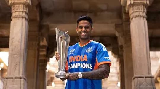 Player holding trophy in traditional architectural setting Player holding trophy in traditional architectural setting