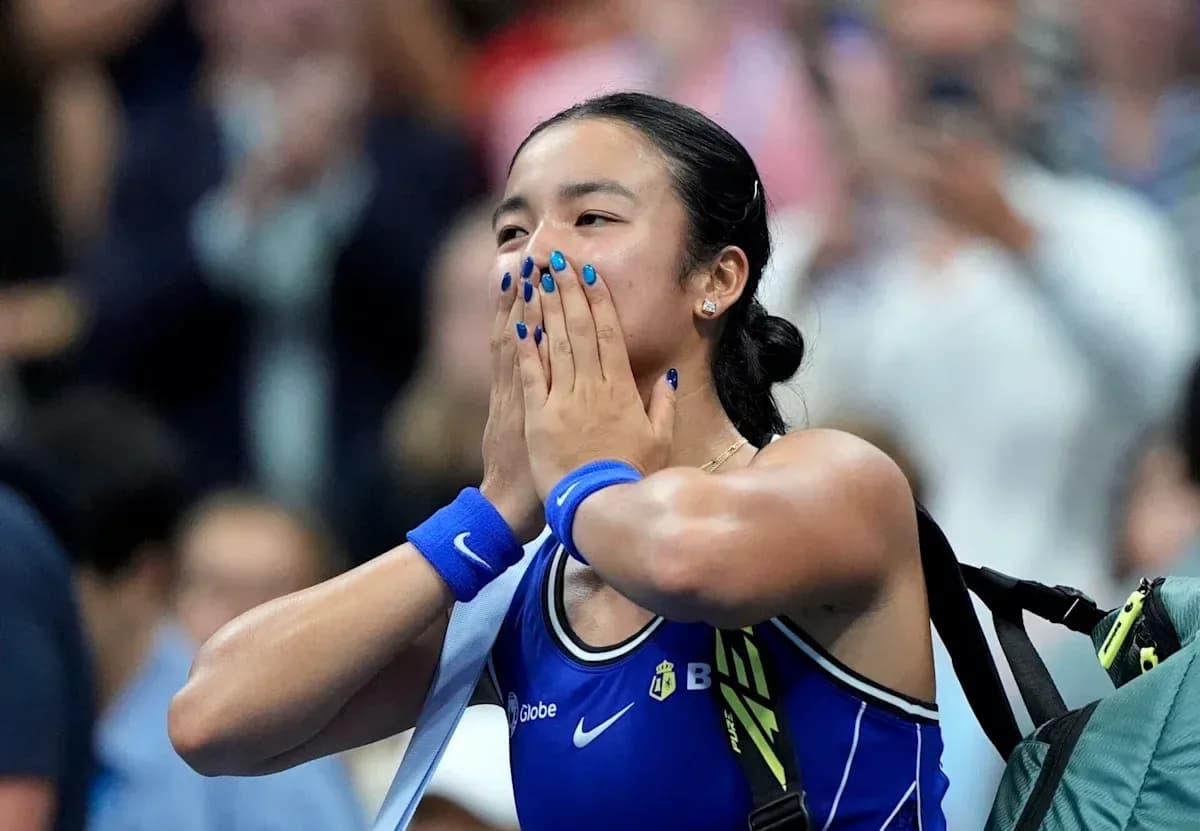 Tennis player celebrating after match victory Tennis player celebrating after match victory