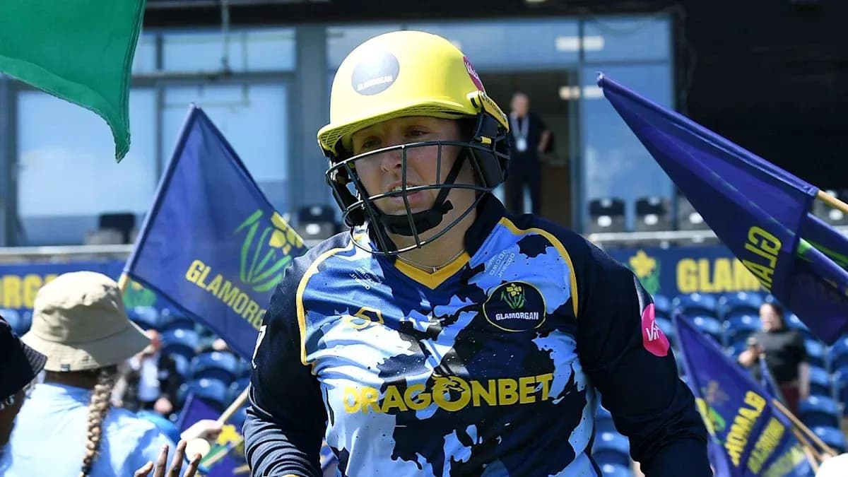 Cricketer in Glamorgan jersey entering the field Cricketer in Glamorgan jersey entering the field