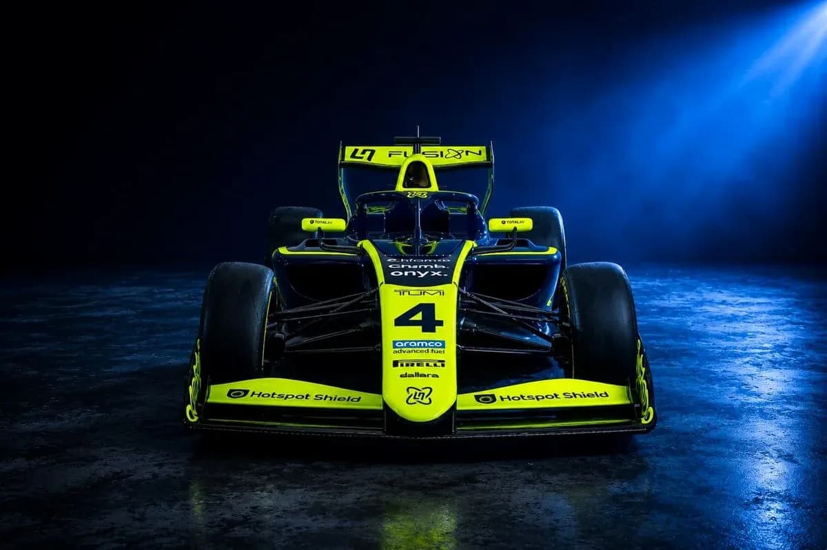 Race car displayed with bright yellow accents Race car displayed with bright yellow accents