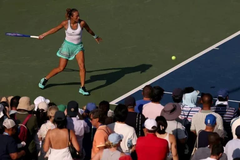 Player hitting a forehand shot during match Player hitting a forehand shot during match