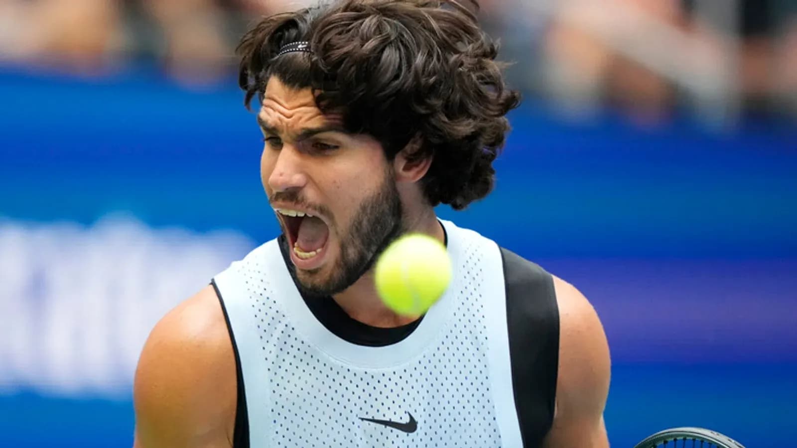 Player celebrating a point during tennis match Player celebrating a point during tennis match