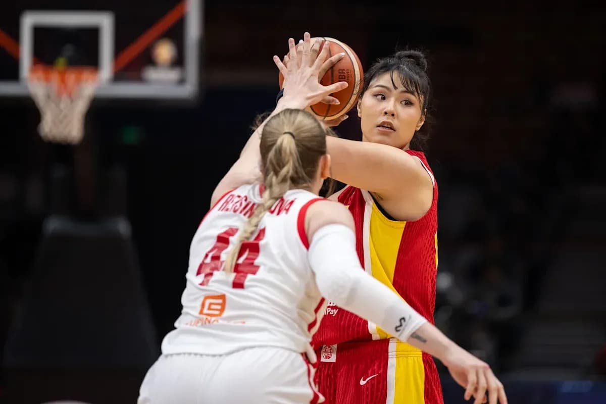 Player preparing to pass the basketball during game Player preparing to pass the basketball during game