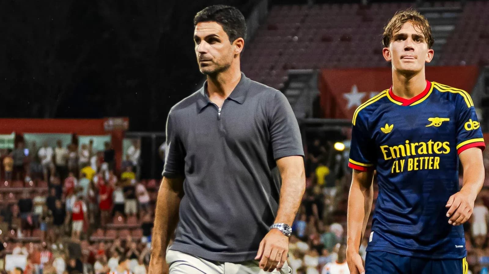 Manager and player walking off the field Manager and player walking off the field