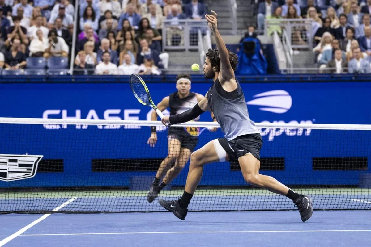 Player returning a tennis ball during a match Player returning a tennis ball during a match