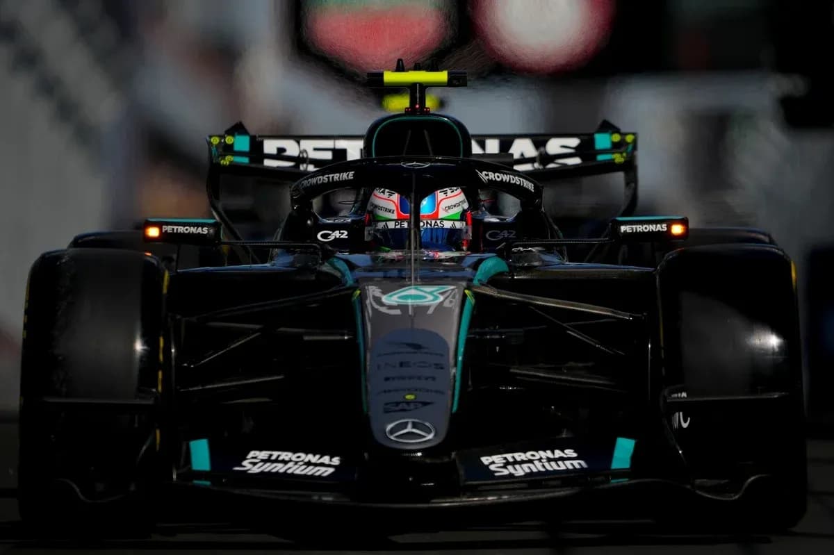 Mercedes Formula 1 car on track during race Mercedes Formula 1 car on track during race