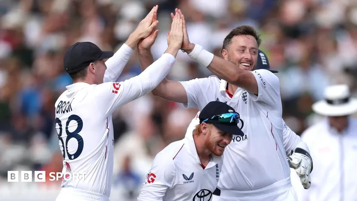 England cricket players celebrating a wicket together England cricket players celebrating a wicket together