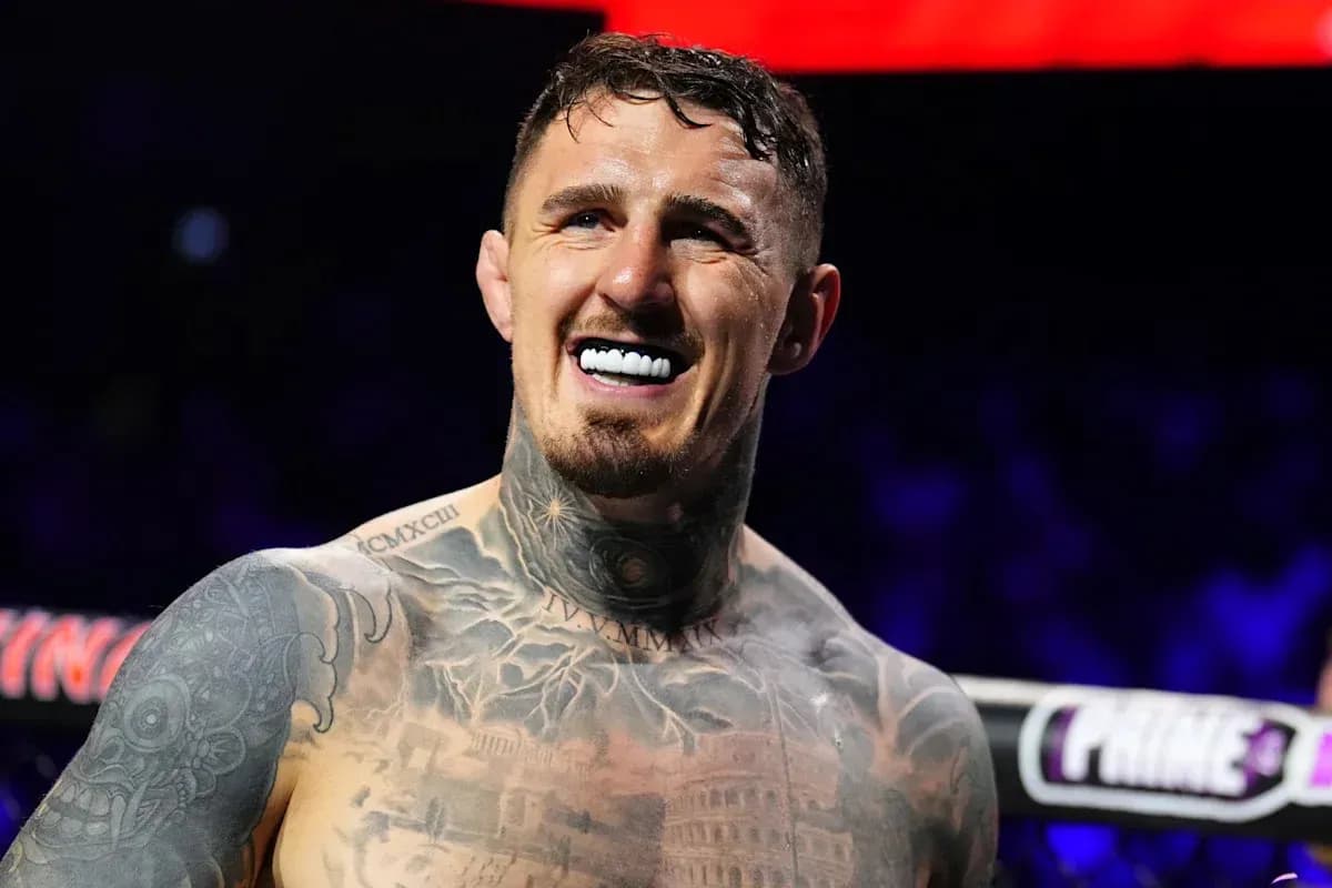 Smiling boxer with tattoos in the ring Smiling boxer with tattoos in the ring