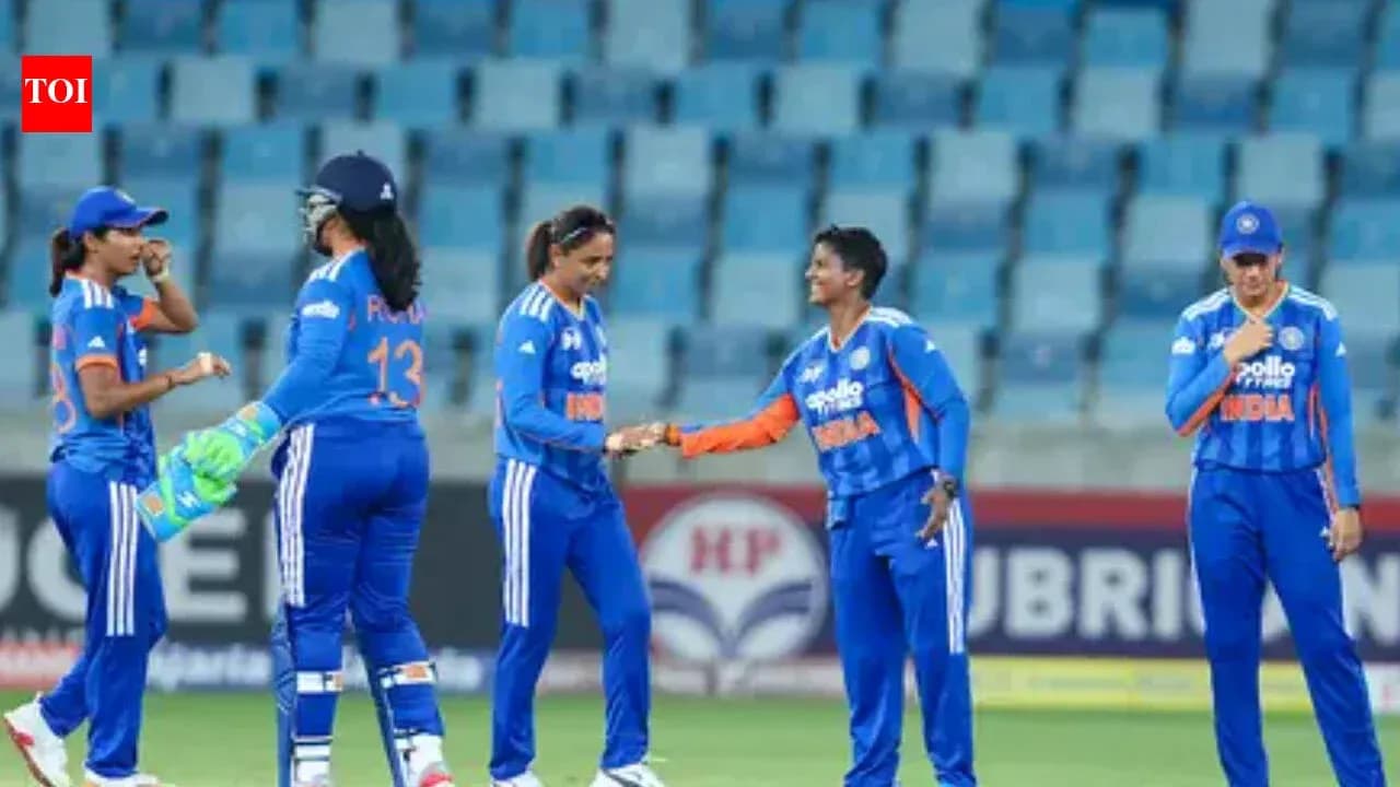 Indian women's cricket team celebrating on field Indian women's cricket team celebrating on field