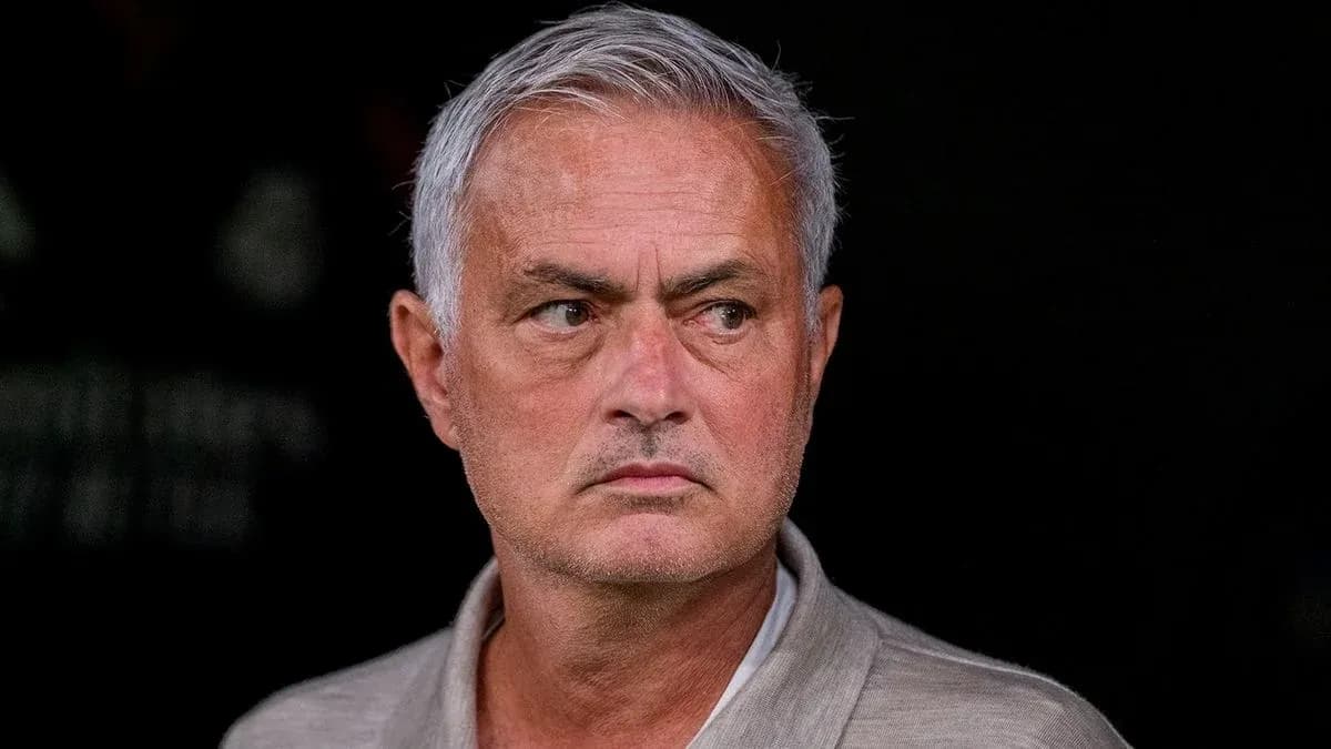 Football manager observing from the sidelines Football manager observing from the sidelines