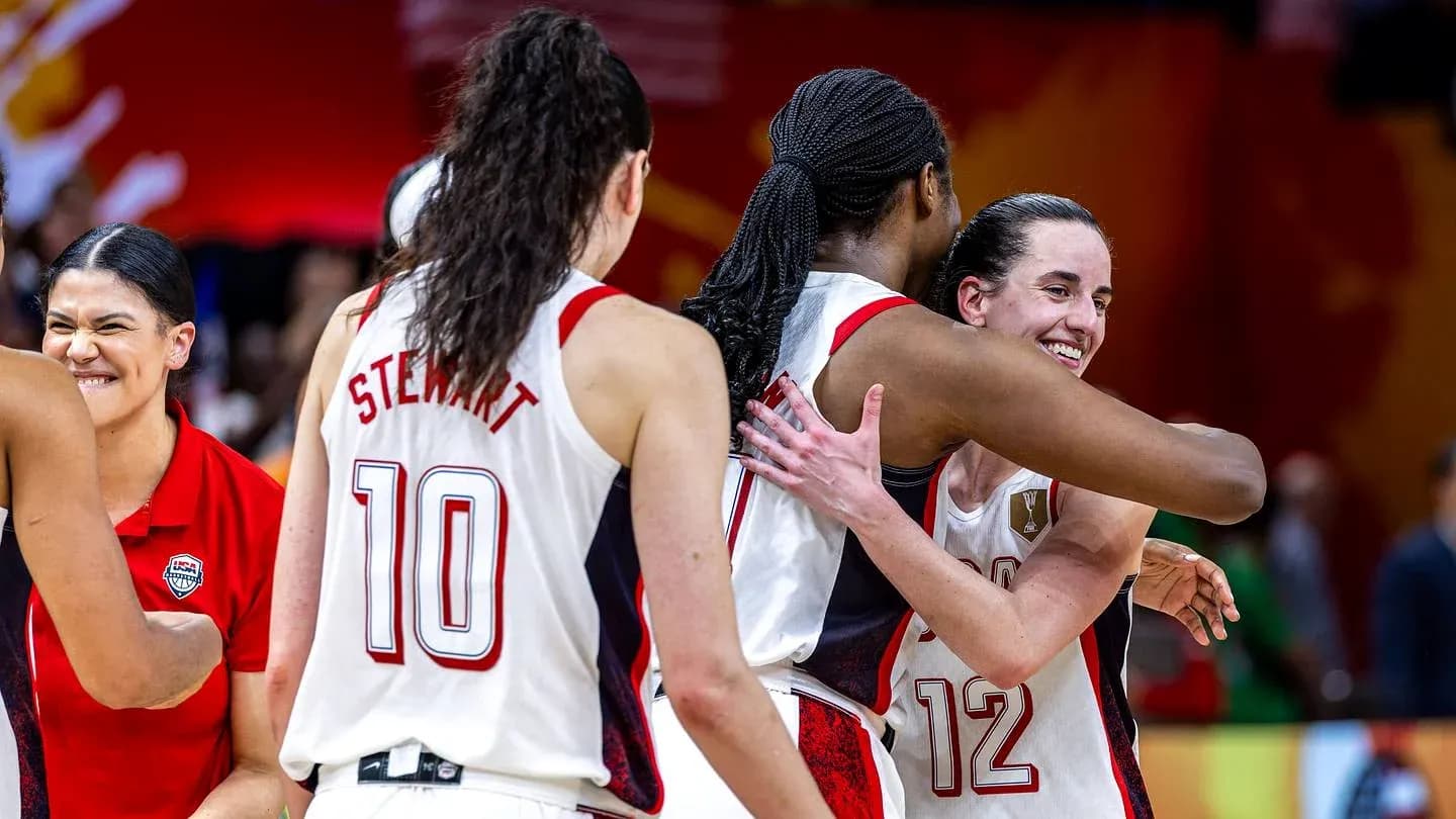 Players celebrating together after a basketball game Players celebrating together after a basketball game