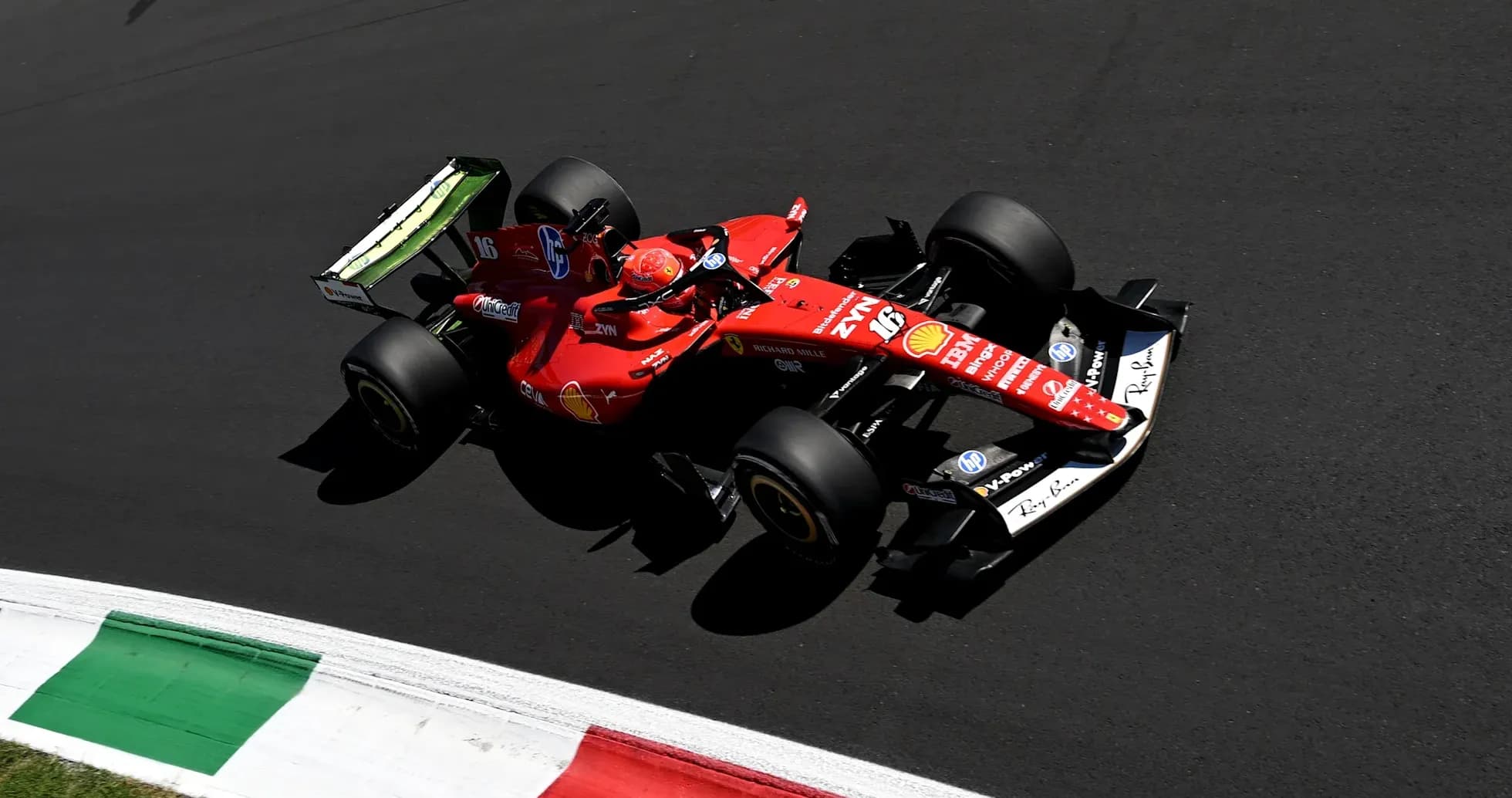 Ferrari Formula 1 car racing on track Ferrari Formula 1 car racing on track