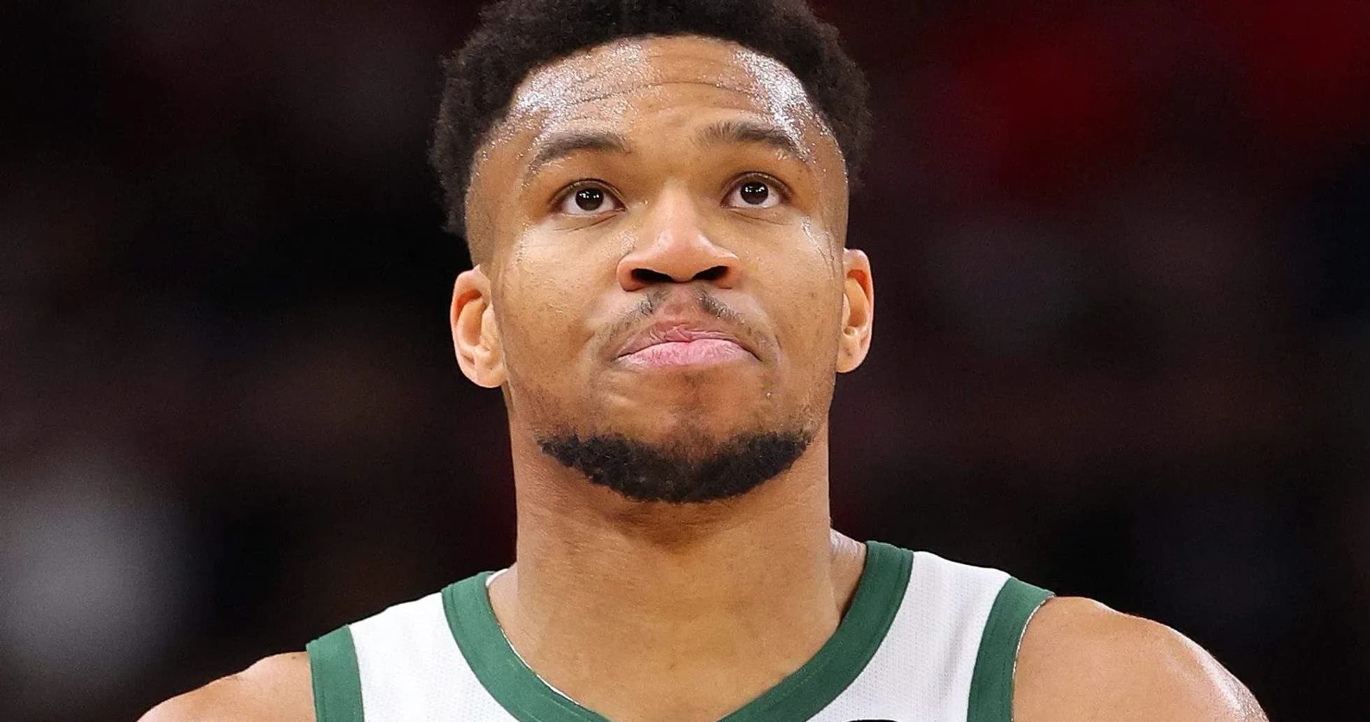 Player looking up during basketball game Player looking up during basketball game