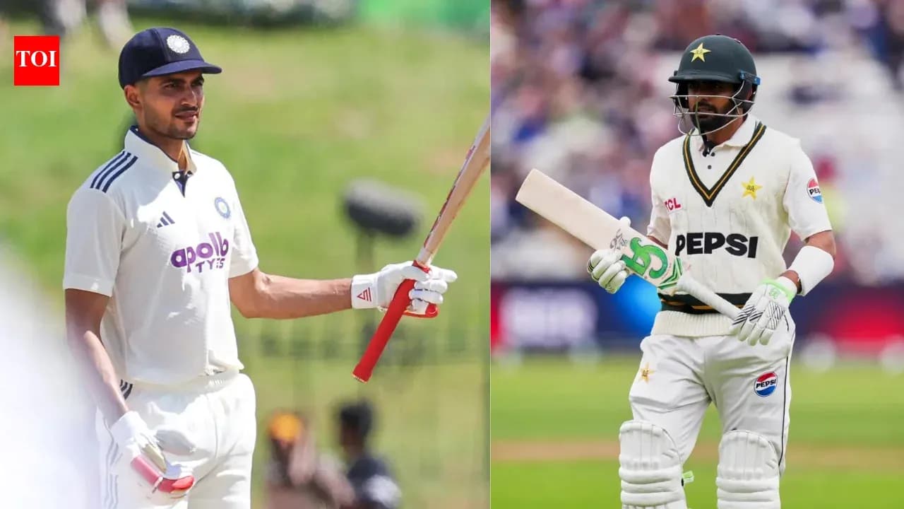 Two cricketers holding bats during a match Two cricketers holding bats during a match