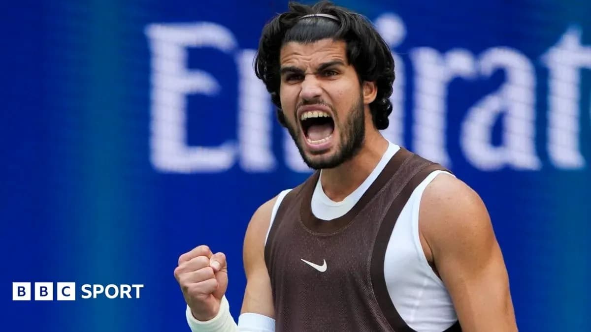 Tennis player celebrating after winning a point Tennis player celebrating after winning a point