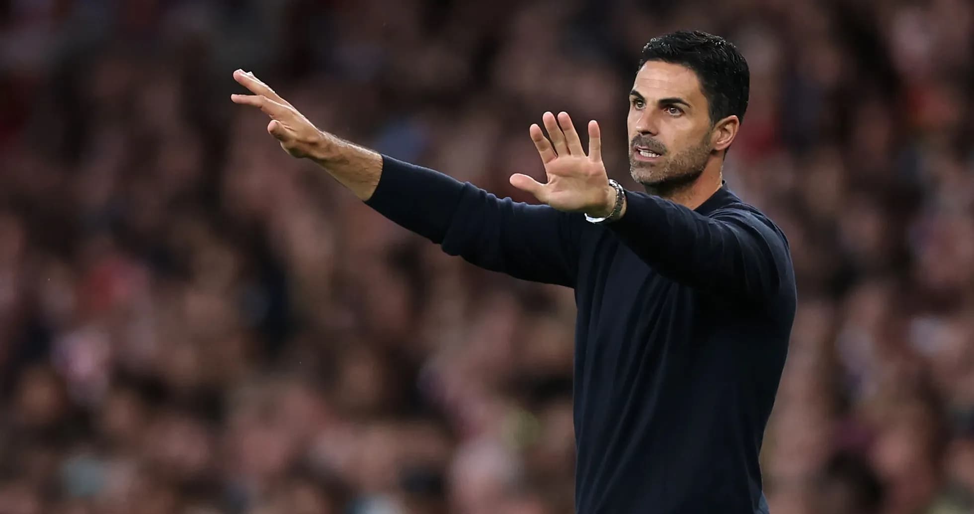 Coach gesturing during a match from the sideline Coach gesturing during a match from the sideline