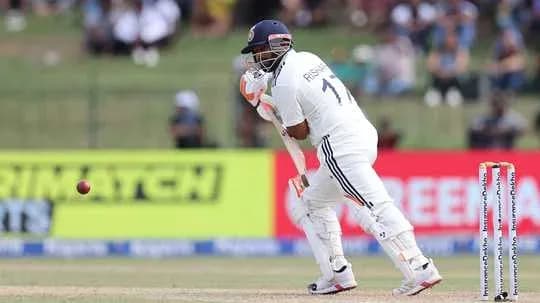 Batsman playing a shot during a cricket match Batsman playing a shot during a cricket match