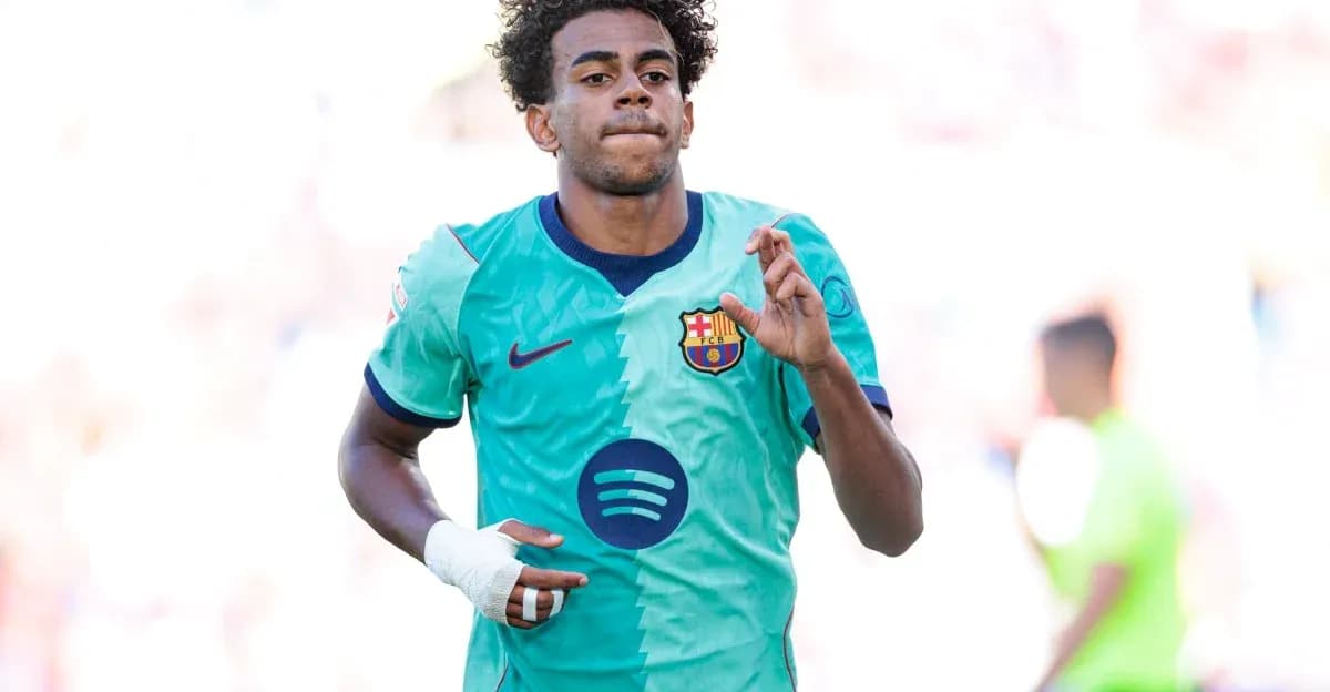 Player celebrating in FC Barcelona away kit Player celebrating in FC Barcelona away kit