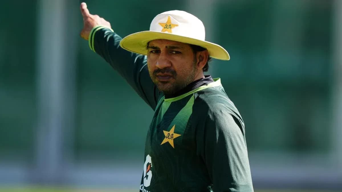 Cricketer gesturing during training session Cricketer gesturing during training session