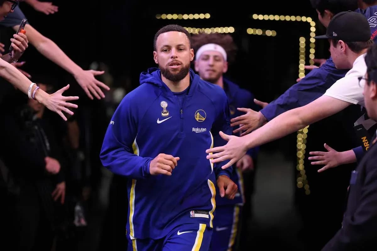 Stephen Curry running through fan tunnel before game Stephen Curry running through fan tunnel before game
