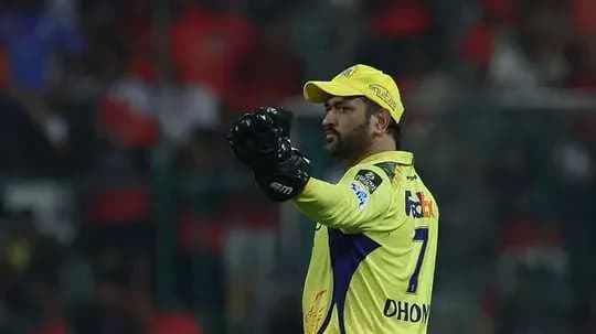 Player signaling during a cricket match Player signaling during a cricket match