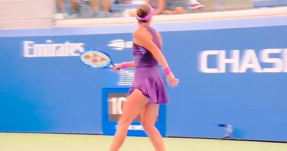 Tennis player preparing to hit a backhand shot Tennis player preparing to hit a backhand shot