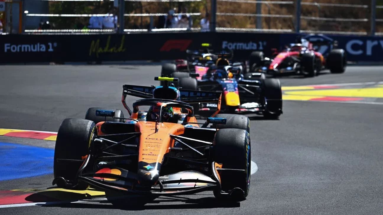 Formula 1 cars racing on track during event Formula 1 cars racing on track during event