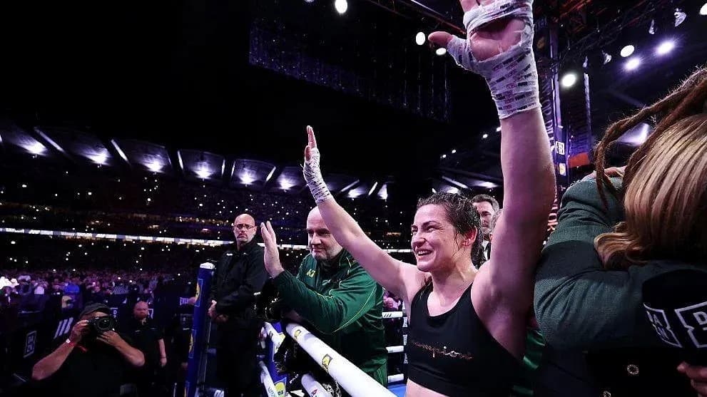 Female boxer celebrating victory in the ring Female boxer celebrating victory in the ring