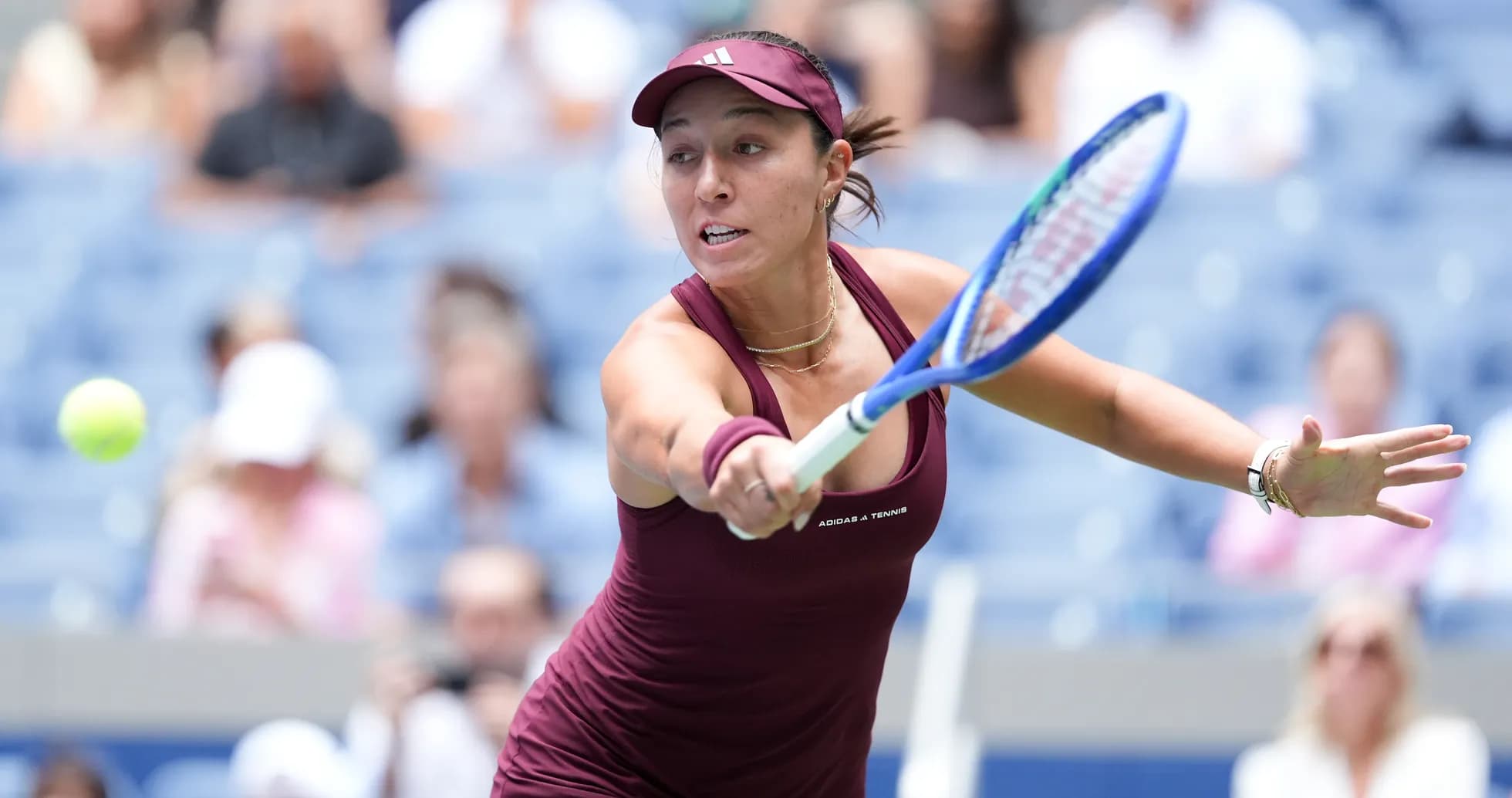 Player hitting a forehand during tennis match Player hitting a forehand during tennis match