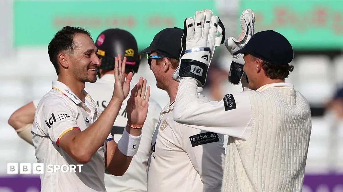 Players celebrating a wicket during cricket match Players celebrating a wicket during cricket match