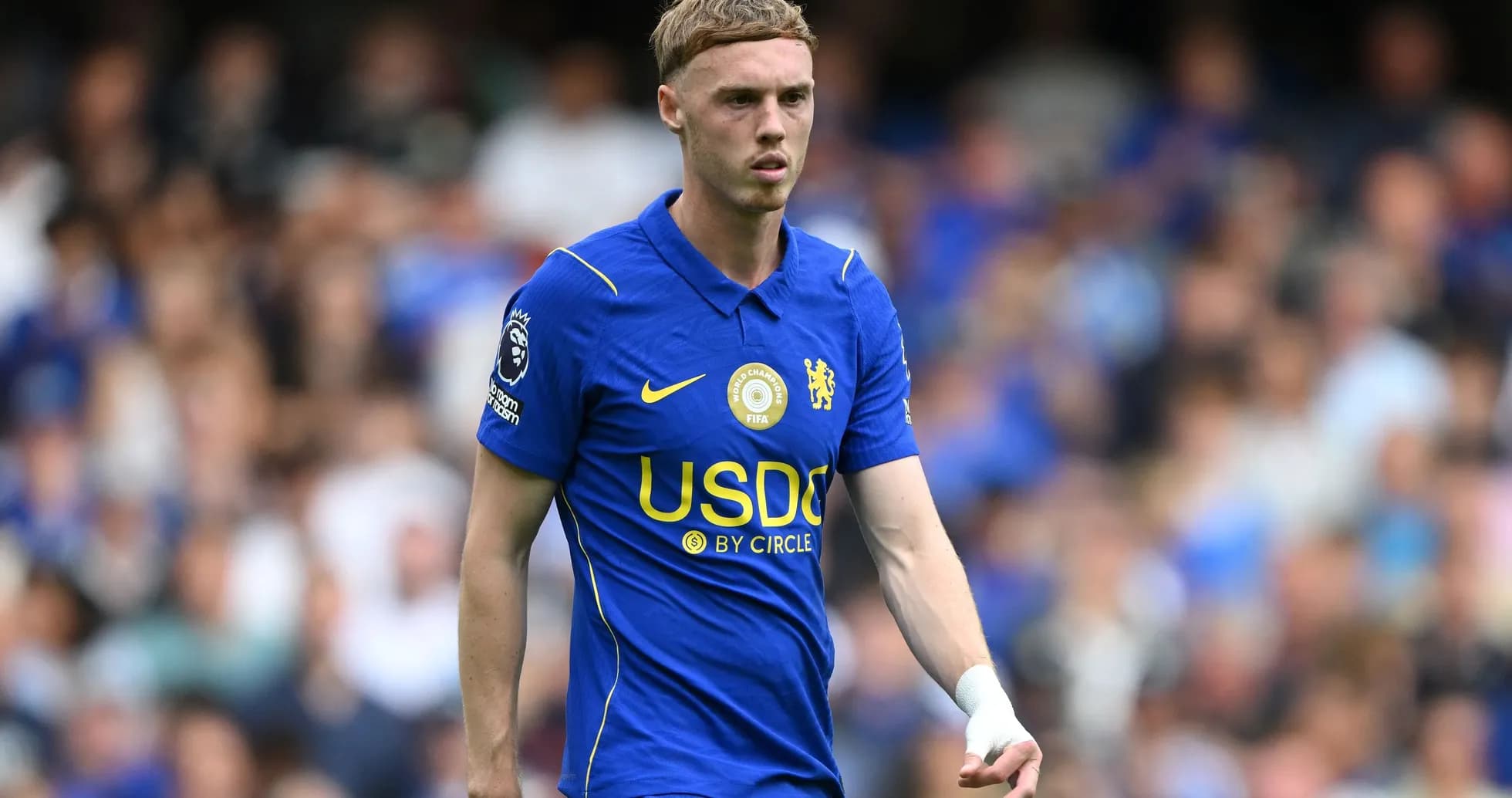 Player wearing Chelsea kit on the pitch Player wearing Chelsea kit on the pitch