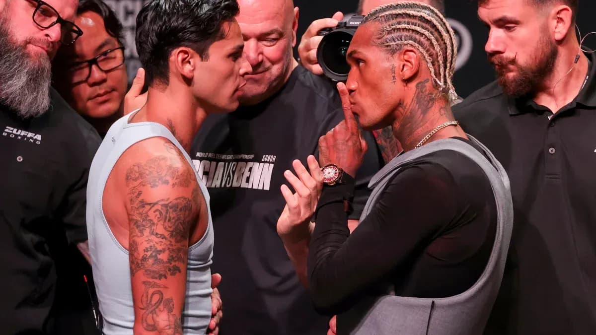 Two boxers facing off at weigh-in event Two boxers facing off at weigh-in event