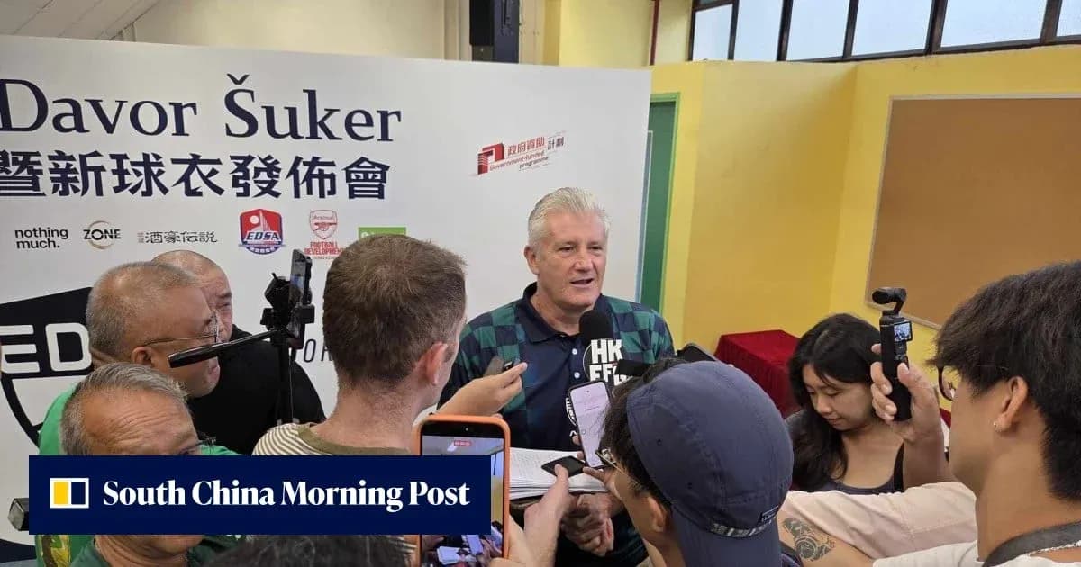 Davor Šuker speaking at press event surrounded by media Davor Šuker speaking at press event surrounded by media