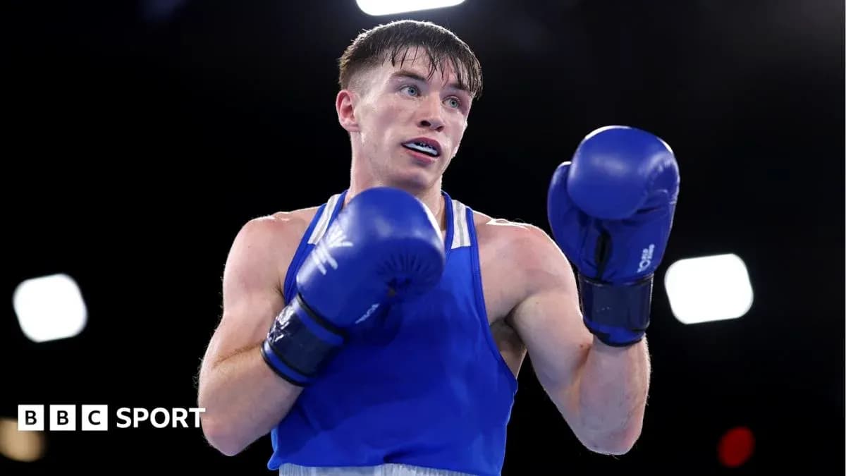 Boxer in blue gloves preparing for a match Boxer in blue gloves preparing for a match