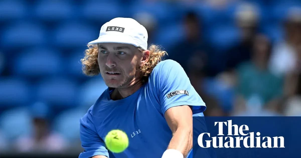 Player hitting tennis ball during match on court Player hitting tennis ball during match on court