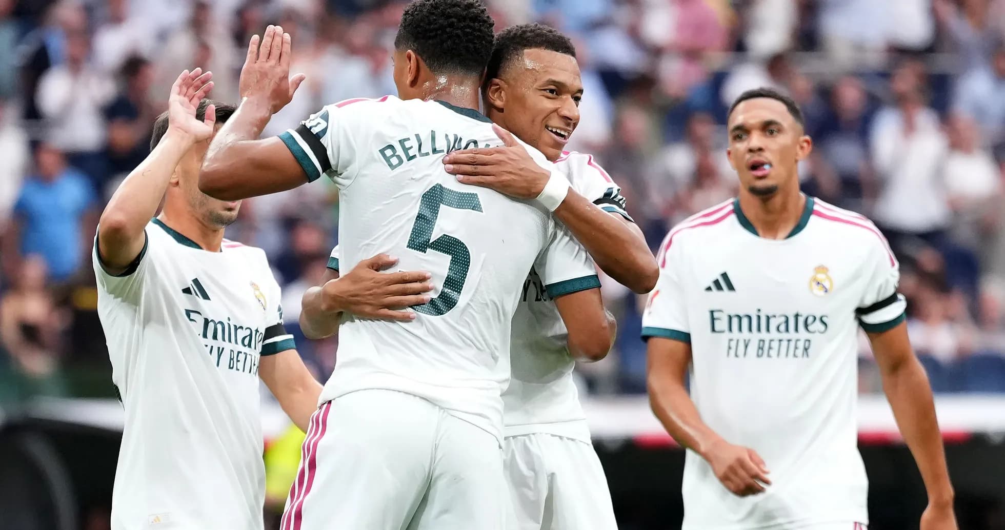Players celebrating after a goal for Real Madrid Players celebrating after a goal for Real Madrid