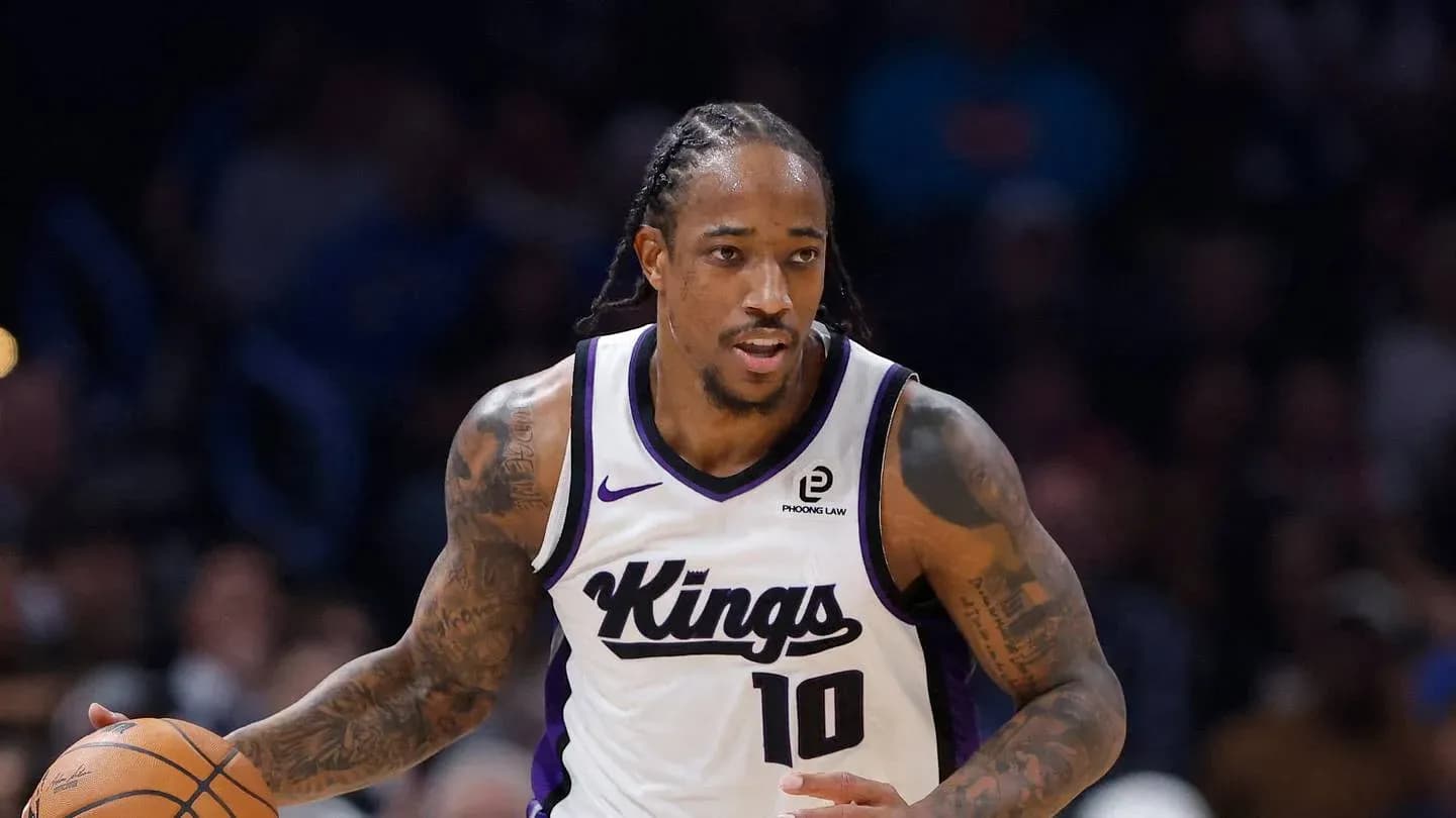 Player dribbling basketball during game for Kings Player dribbling basketball during game for Kings