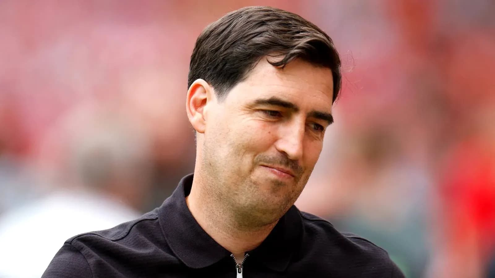 Manager in a black shirt during match day Manager in a black shirt during match day