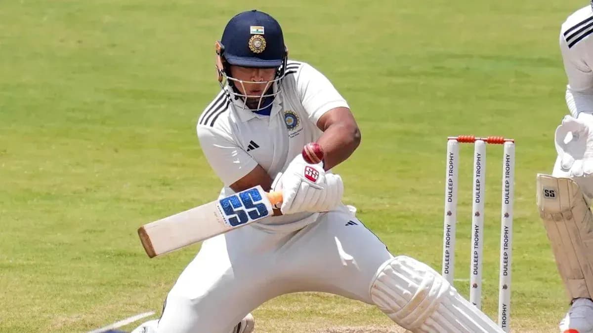 Batsman playing a shot during a cricket match Batsman playing a shot during a cricket match