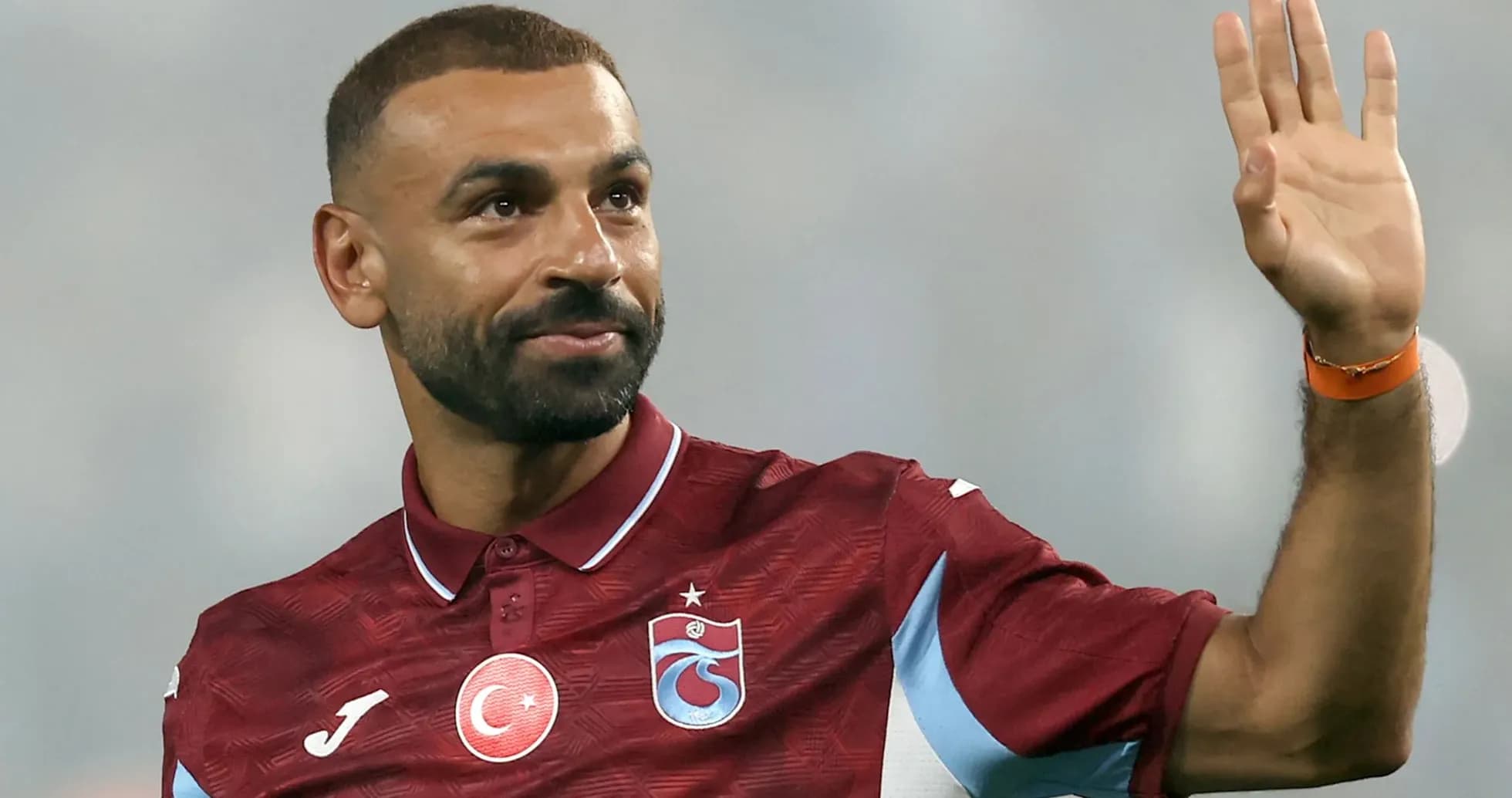 Player waving while wearing Trabzonspor jersey Player waving while wearing Trabzonspor jersey