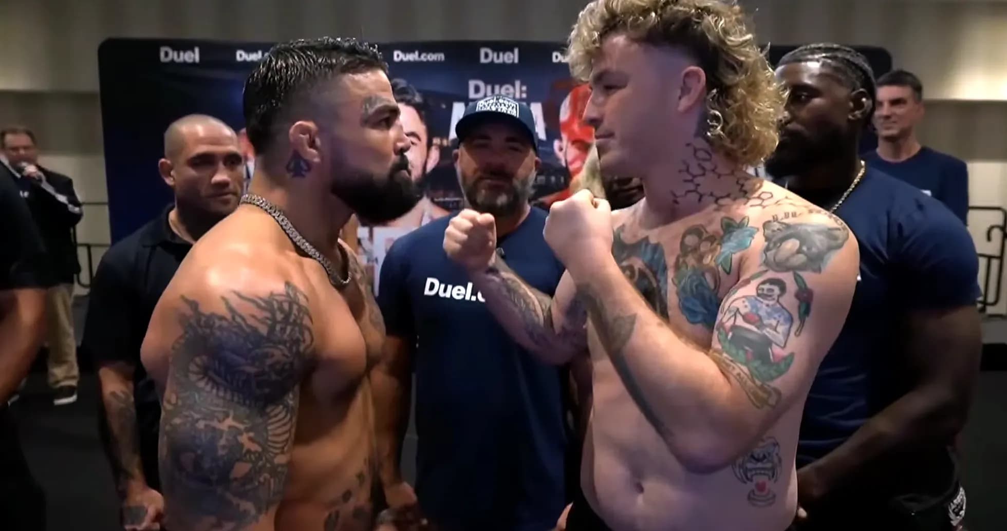 Two fighters face off at weigh-in event Two fighters face off at weigh-in event